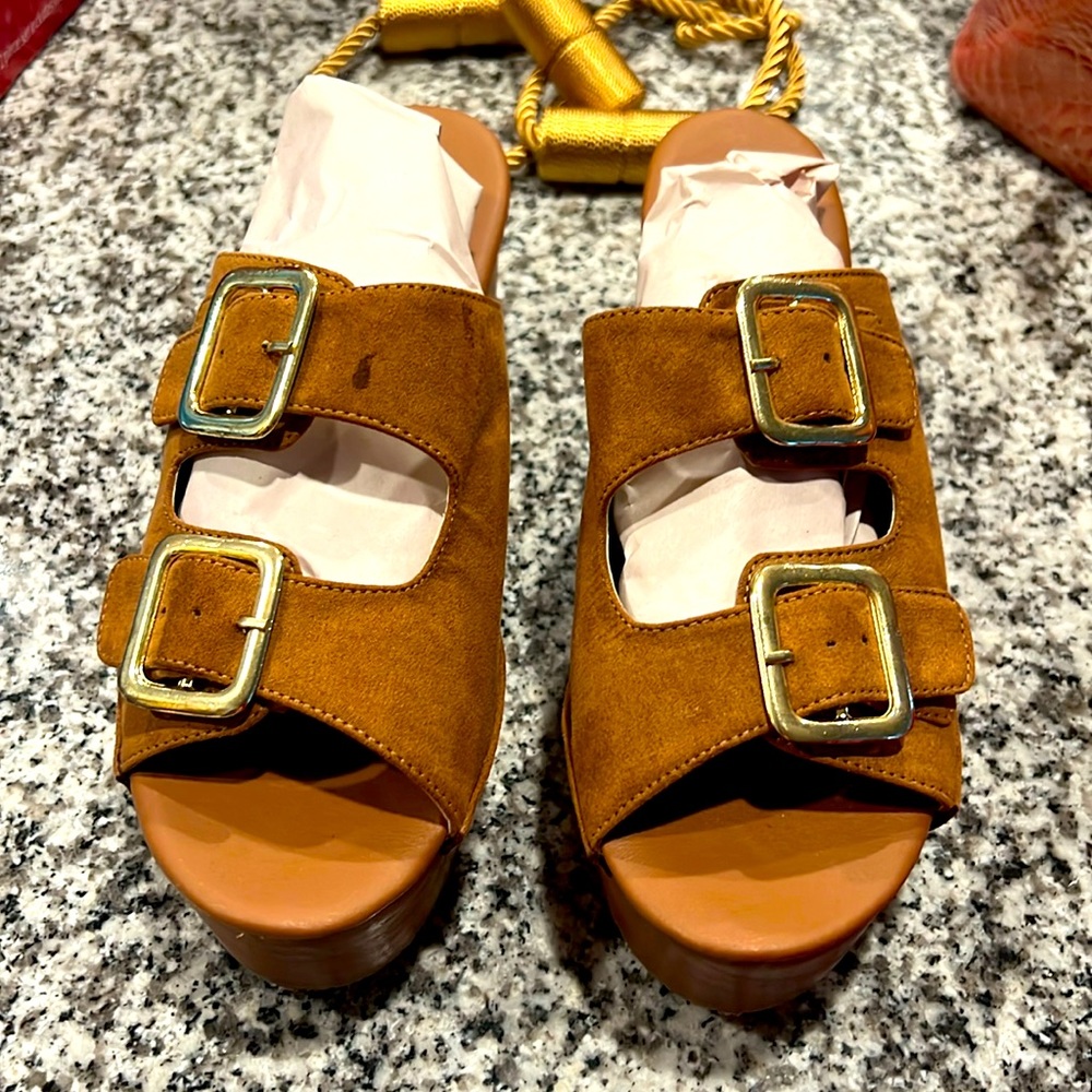 Brand new, never worn, made in Columbia
